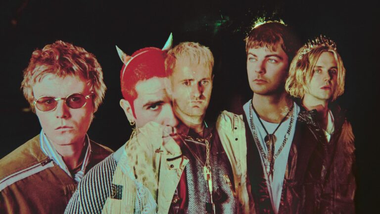 The five members of Fontaines D.C. in a theatrical 2026 promotional portrait against a dark background.