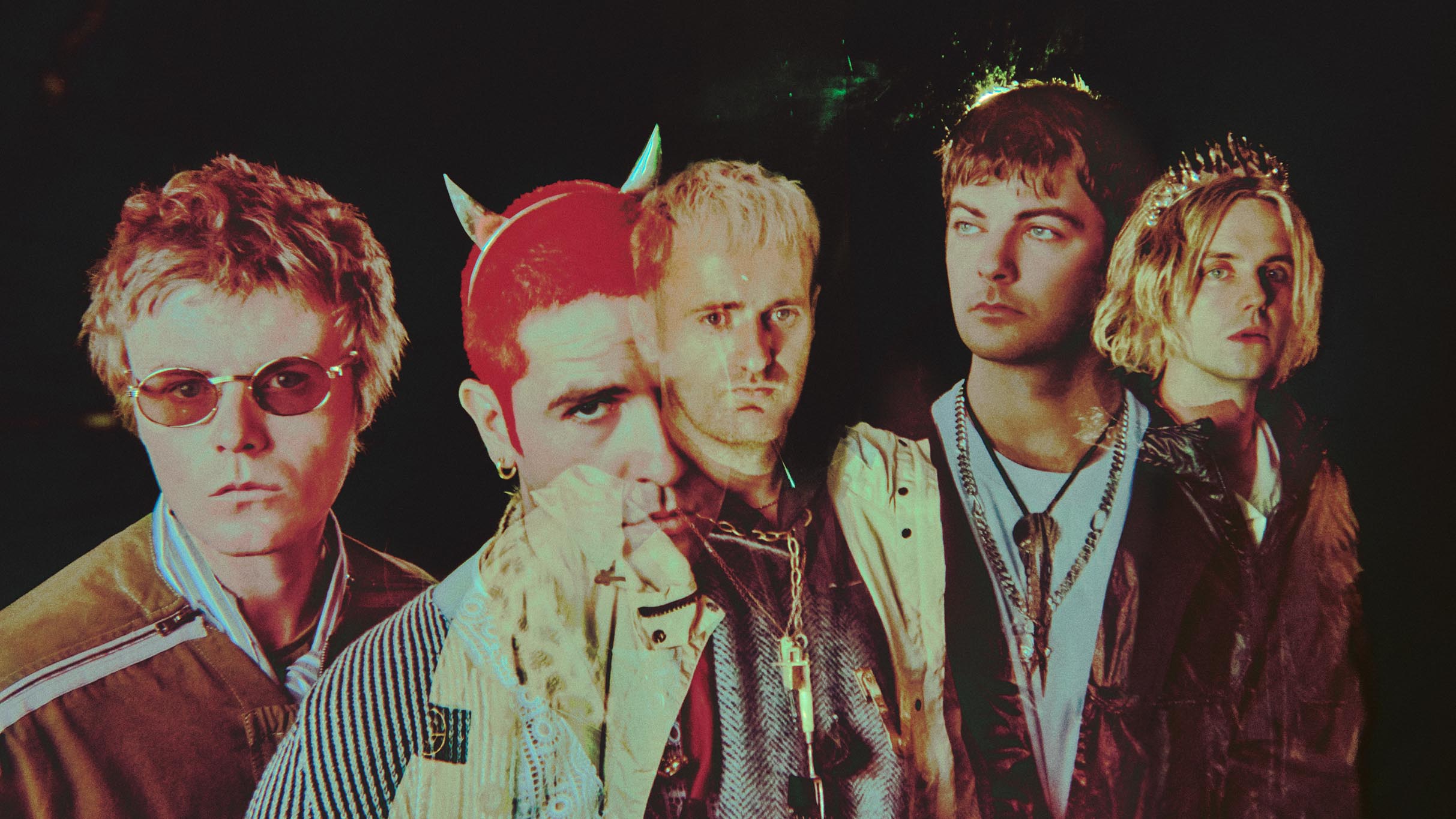 The five members of Fontaines D.C. in a theatrical 2026 promotional portrait against a dark background.